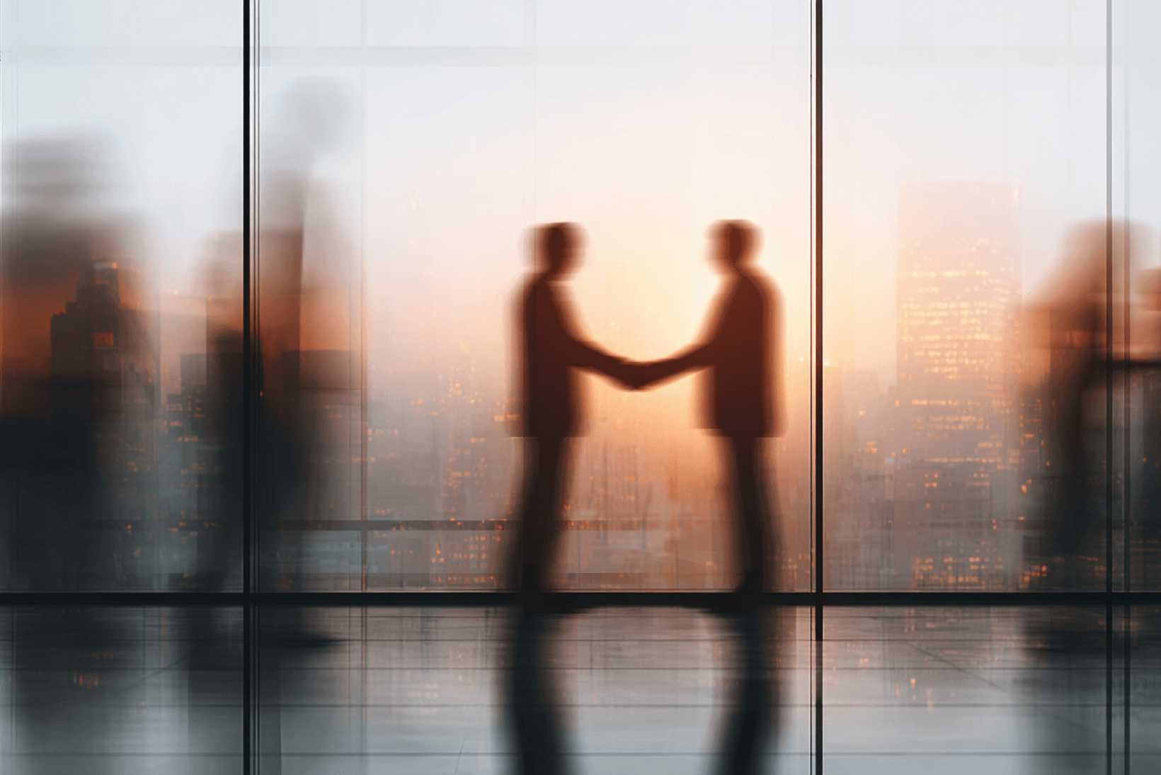 Two lawyers shaking hands