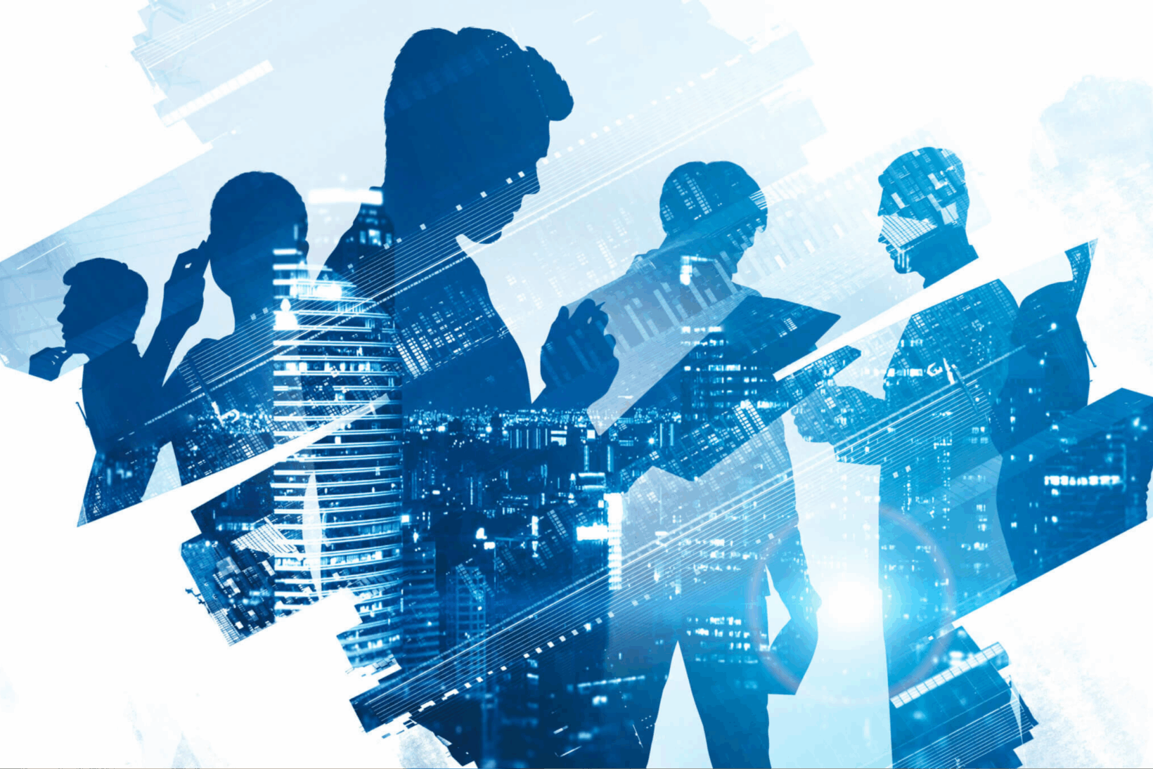 A double-exposure showing a group of professional office workers superimposed over a city's skyline