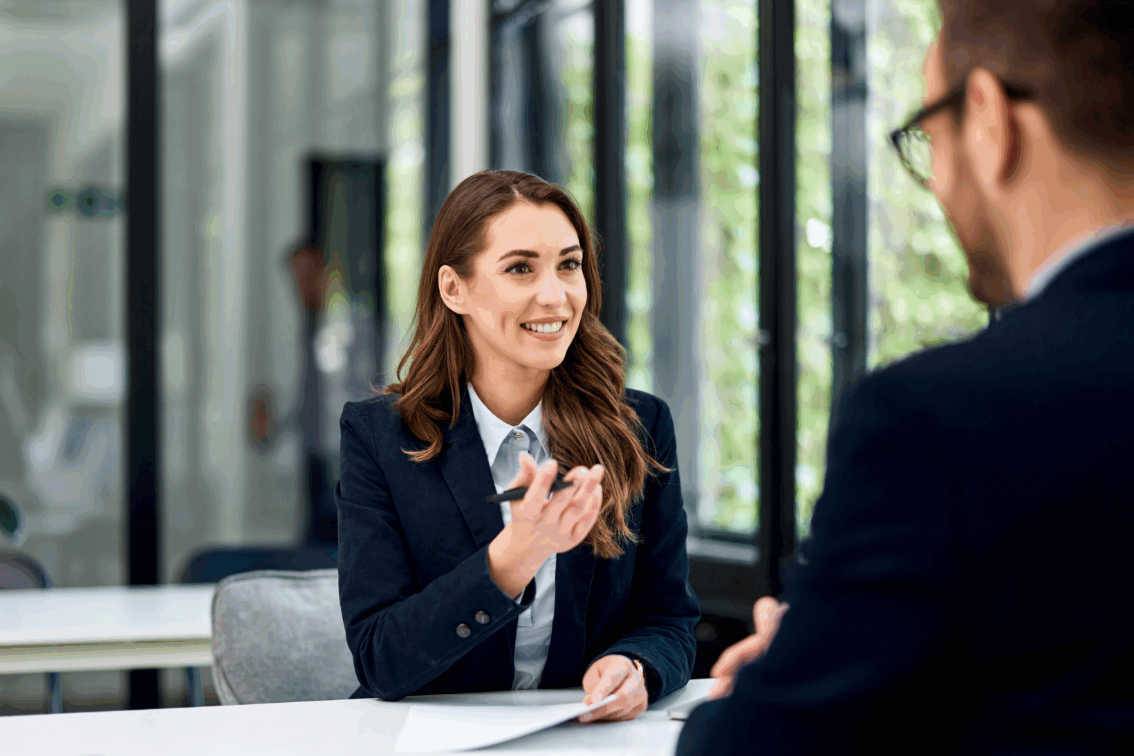 A woman partaking in a law firm job interview