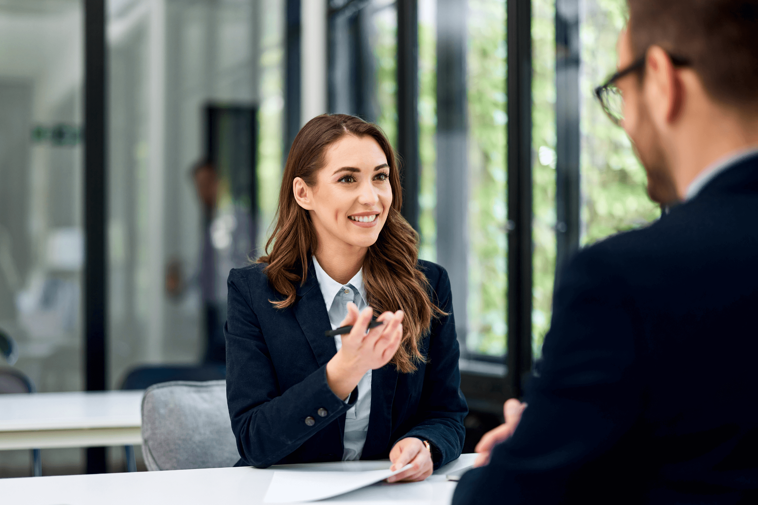 A woman partaking in a law firm job interview